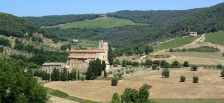 Distant view of Abbazia di Sant’Antimo on Tuscany Bike Tour