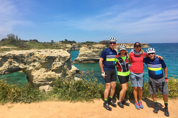 Group at seaside cliffs in Puglia