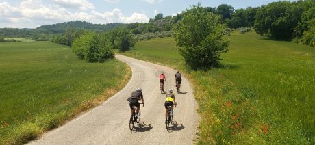 Group of cyclists in Italian countryside on Ride Across Italy bike tour