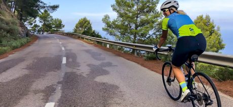 Cyclist climbing road on a Mallorca Ride Camp