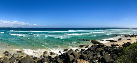 Panoramic view of Snapper rocks beach with water and waves